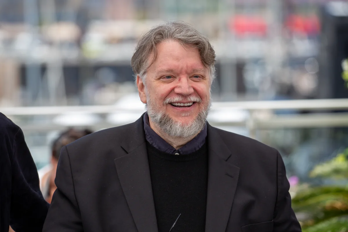 Guillermo del Toro smiling at a photocall at the 2025 Cannes Film Festival